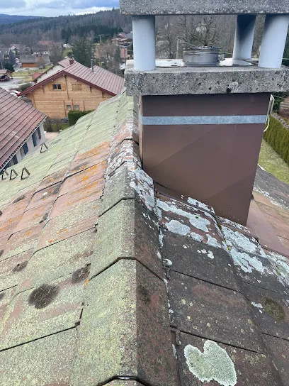 Image de renov toit 39 Dépannage vitrerie/Démoussage toiture/demoussage